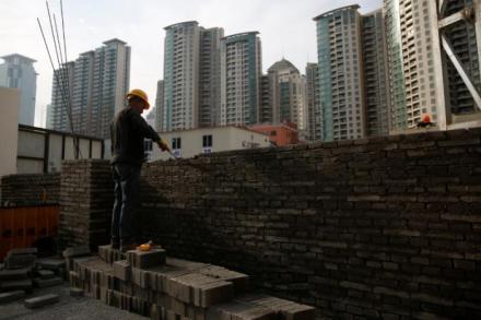 A worker works at a construction site in Shanghai, China. (Reuters)
