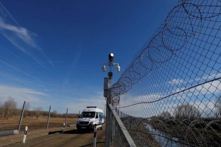 A Hungarian police van passes by an intelligent fence post as it patrols the fortified Hungary-Serbia border near the village of Asotthalom. (Reuters) A Hungarian police van passes by an intelligent fence post as it patrols the fortified Hungary-Serbia border near the village of Asotthalom. (Reuters)