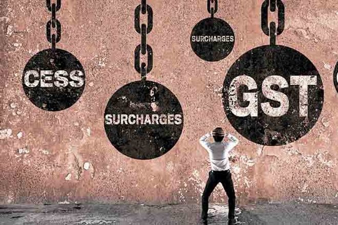 GST, Arun Jaitley, Narendra Modi, BJP, Veerappa Moily, NDA, Congress, AIADMK