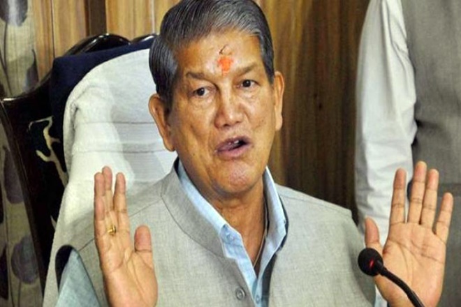 Addressing a press conference here, Rawat said: "I want to thank 'Modi Kranti' (revolution) and EVM 'chamatkar' (miracle).(PTI) Addressing a press conference here, Rawat said: "I want to thank 'Modi Kranti' (revolution) and EVM 'chamatkar' (miracle).(PTI)
