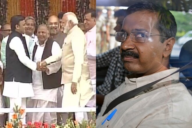 Narendra Modi, prime minister narendra modi, narendra modi and akhilesh yadav, narendra modi hugs akhilesh yadav, modi akhilesh yadav smiling, akhiesh yadav, prime minister naredra modi, pm modi, arvind kejriwal