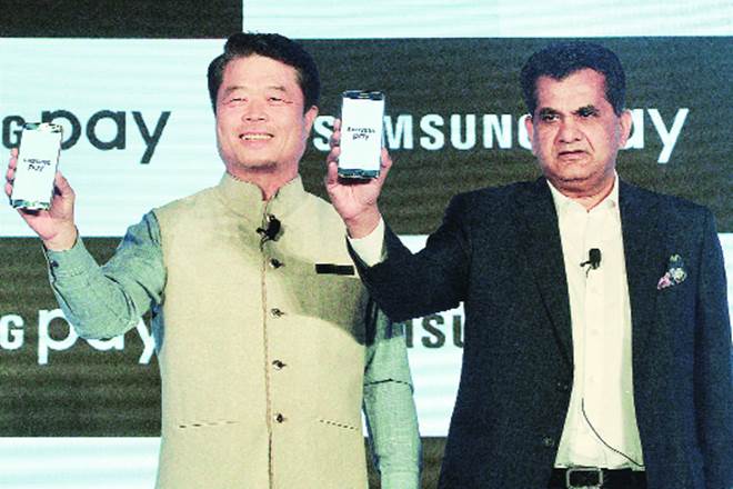 NITI Aayog CEO Amithabh Kant and Samsung South-West Asis president cum CEO HC Hong. NITI Aayog CEO Amithabh Kant and Samsung South-West Asis president cum CEO HC Hong.