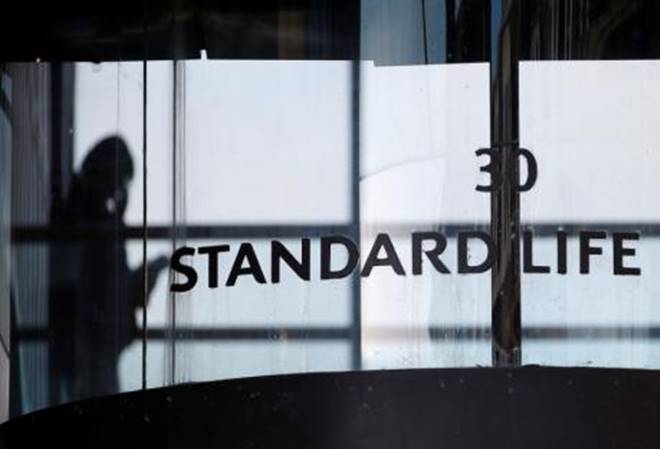Aberdeen’s investors will receive 0.757 new Standard Life ordinary share for each share they already own. (Reuters)