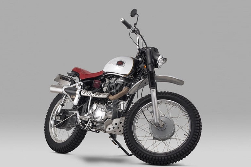 The fuel tank which gets a generous dose of chrome along with other additions was designed keeping the concept's vision of a go-anywhere design. Attention to detail can be seen in the design where the right side storage box fuses with the high-mounted exhaust doubling up as a cover. Apart from the Scrambler 350 branding, the rear rear sub-frame has been reworked and other additions include a skid plate, high mounted mud flaps and off-road tyres.