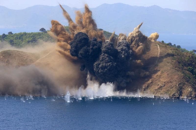 North Korea conducted a big live-fire exercise to mark the foundation of its military and a US submarine docked in South Korea in a show of force amid growing concern over the North's nuclear and missile programmes. (Reuters)