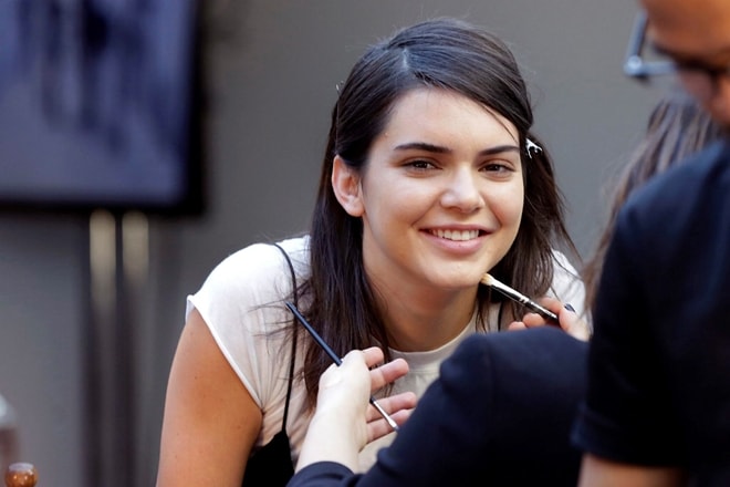 Pepsi is not saying whether it will continue to run an ad, featuring Jenner, that is being widely criticized and mocked on social media for appearing to trivialize protests for social justice causes. (AP)