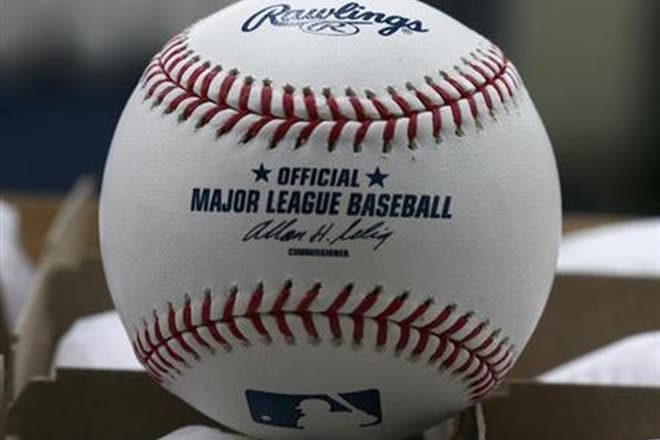 The Indians have reduced its usage, but the logo, which has been part of the team's history for more than 60 years, still appears on some of Cleveland's game caps and jerseys. (Reuters)