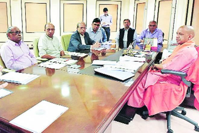 UP chief minister Yogi Adityanath meeting sugar industry representatives in Lucknow on Wednesday.