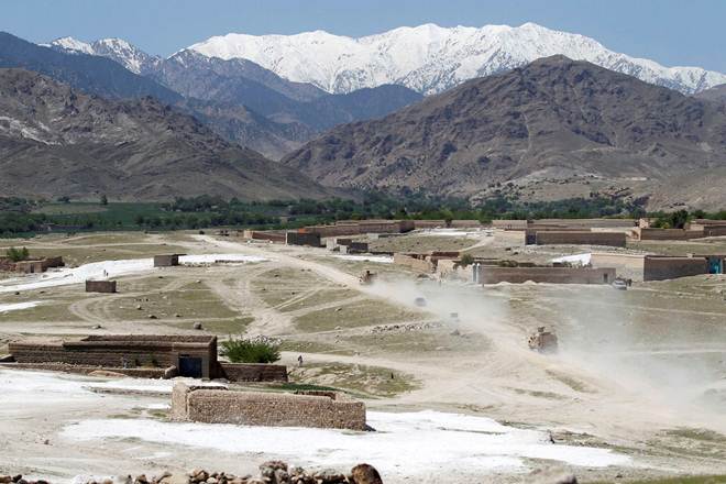 US armoured vehicles patrol in Pandola village near the site of a U.S. bombing in the Achin district of Nangarhar province in eastern Afghanistan. (Reuters)