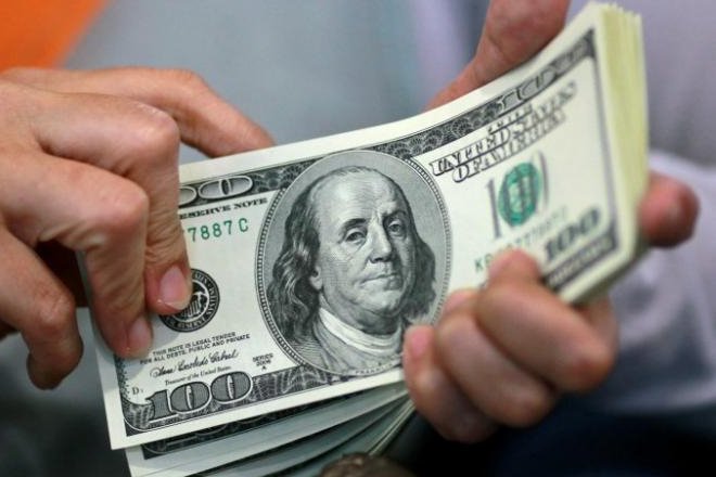 The dollar index against a basket of major currencies was little changed at 98.931 after rising to 99.332 overnight. (Reuters)