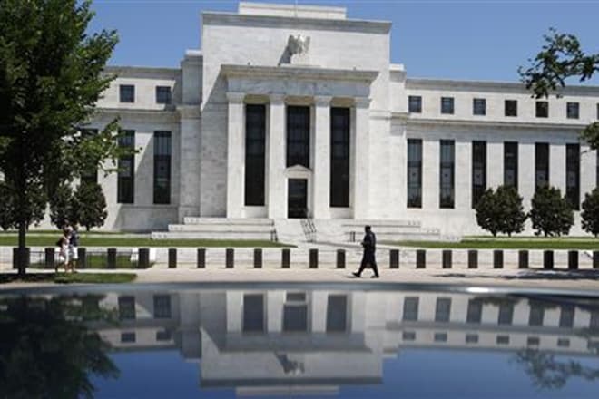 The Fed accumulated almost one-quarter of the mortgage bonds sold by government-linked agencies over the last year. (Reuters)