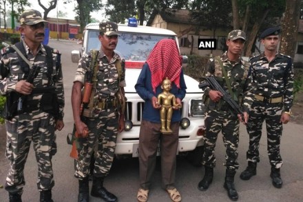 In a successful attempt by the Sashastra Seema Bal personnel, a person has been detained while trying to smuggle an 'Ashtadhatu' (metallic) idol near Siliguri in West Bengal from a place along Indo-Nepal border. (ANI)