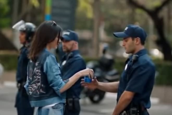 The company apologized on Twitter. It wrote, "Pepsi was trying to project a global message of unity, peace, and understanding. (Screenshot from the ad) The company apologized on Twitter. It wrote, "Pepsi was trying to project a global message of unity, peace, and understanding. (Screenshot from the ad)