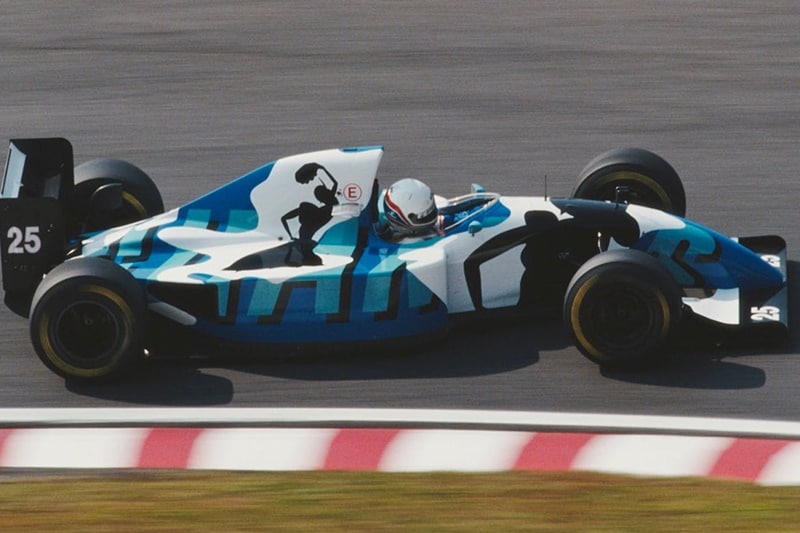Ligier ran the race at the 1993 Japanese GP driven by Martin Brundle, and donned a paint job that looked like buckets of white, blue and darker blue paint was just poured over it.