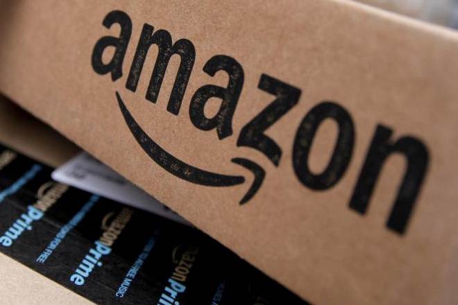 More fees from Amazon's Prime shopping club and media streaming services, along with growing advertising revenue, also boosted results. (Reuters)
