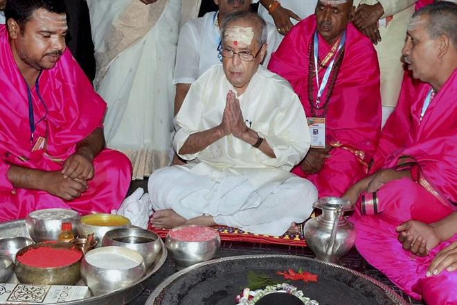 President Pranab Mukharjee offering puja at Babadham Temple at Deoghar district of Jharkhand. (PTI) President Pranab Mukharjee offering puja at Babadham Temple at Deoghar district of Jharkhand. (PTI)