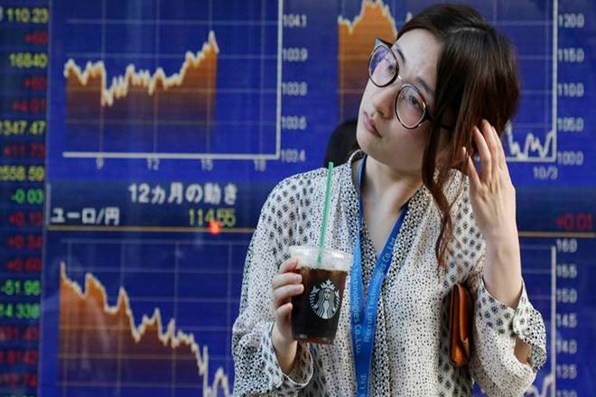 South-East Asia stocks-largely flat; Singapore edges up, led by financials