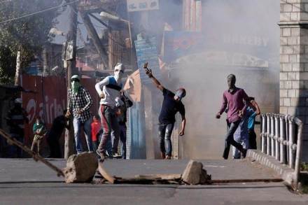 Demonstrators hurl stones towards policemen during a protest in Srinagar, against the recent killings in Kashmir region. (File Photo: Reuters)