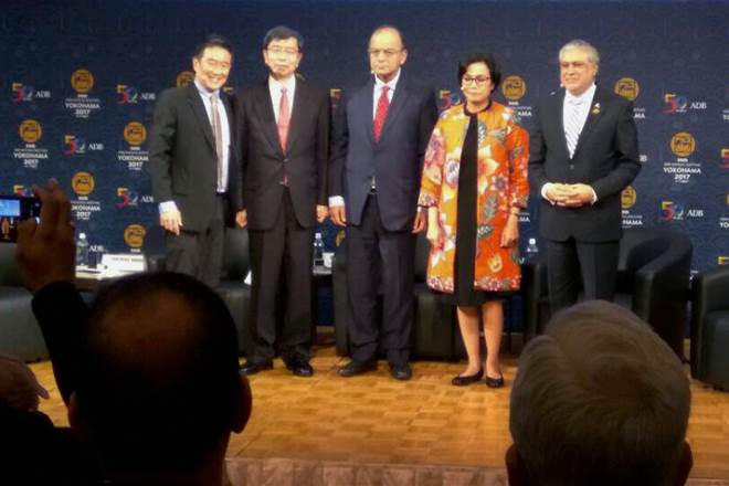 Finance Minister Arun Jaitley with his Pakistani counterpart (1st R) Ishaq Dar at the ADB annual meeting in Yokohama on Saturday. (PTI)