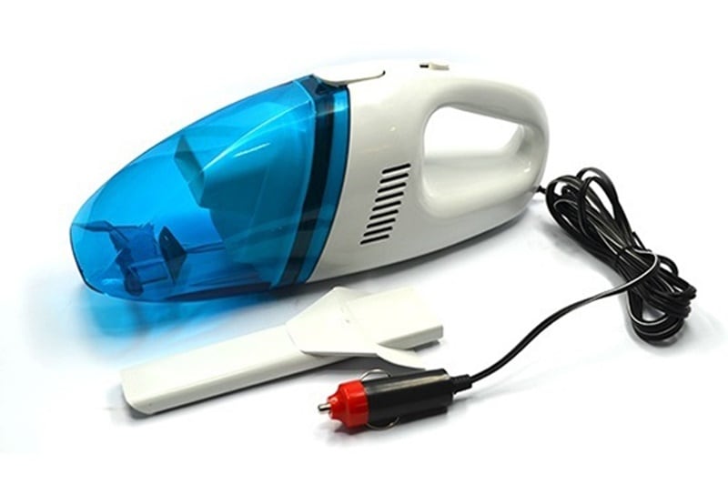Vacuum cleaning: There are small vacuum cleaners that can be powered by the car's power socket. You could get to dirt at spots that are difficult to get to with a duster or a brush. (Image: Snapdeal)