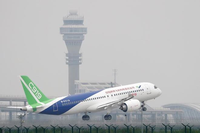 A Chinese C919 passenger jet takes off on its first flight at Pudong International Airport in Shanghai, Friday, May 5, 2017. (Reuters)