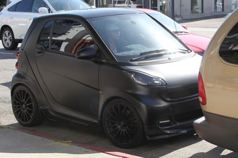 Smart Car: Yep, he got a custom matte black paint job for his little Smart car. He had the logo of the brand at the back of the car replaced with the words 'Swag Car'! (Image: Flynetpictures) <strong>Also read:</strong> <strong><a href="https://www.financialexpress.com/auto/gallery/from-priyanka-chopra-to-sunny-leone-car-collections-of-bollywood-actresses/photos/655190/">From Priyanka Chopra to Sunny Leone: Car collections of Bollywood actresses</a></strong>
