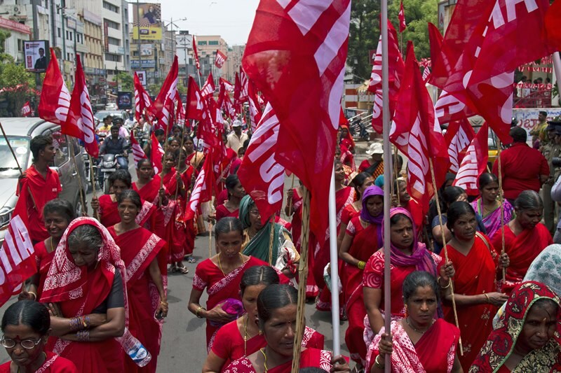 Members of All India Trade Union Congress (AITUC) march in a rally to mark May Day in Hyderabad, India. (Reuters)