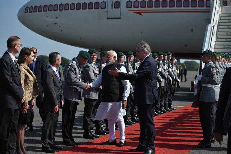 Narendra Modi, Narendra Modi visit to Germany, narendra modi in germany, Narendra Modi visit to Germany, narendra Modi, narendra Modi picture gallery, modi four nation tour, modi live, modi news, modi in germany, narendra modi news, modi images, modi germany images, modi merkel, modi russia, angela merkel, india news