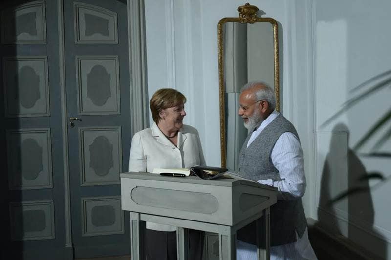 Narendra Modi, Narendra Modi visit to Germany, narendra modi in germany, Narendra Modi visit to Germany, narendra Modi, narendra Modi picture gallery, modi four nation tour, modi live, modi news, modi in germany, narendra modi news, modi images, modi germany images, modi merkel, modi russia, angela merkel, india news