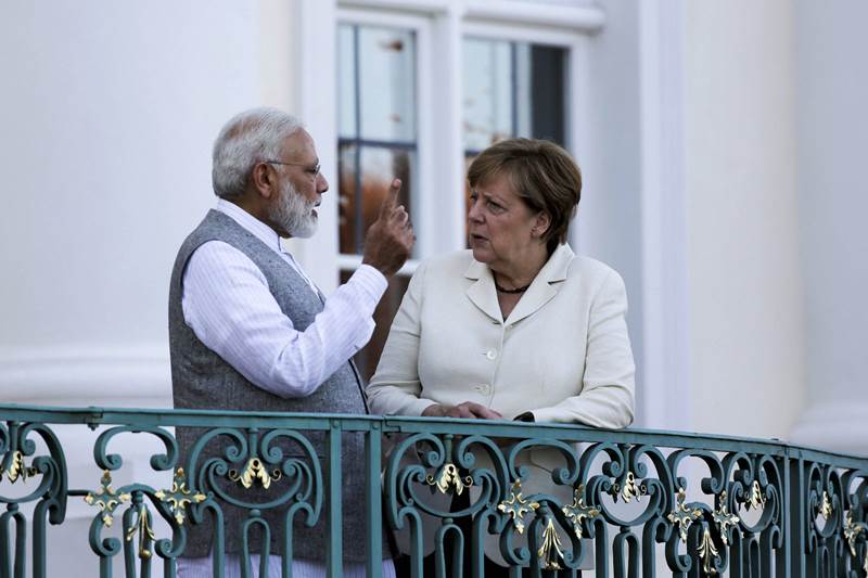 Narendra Modi, Narendra Modi visit to Germany, narendra modi in germany, Narendra Modi visit to Germany, narendra Modi, narendra Modi picture gallery, modi four nation tour, modi live, modi news, modi in germany, narendra modi news, modi images, modi germany images, modi merkel, modi russia, angela merkel, india news