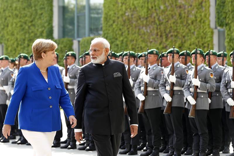 Narendra Modi, Narendra Modi visit to Germany, narendra modi in germany, Narendra Modi visit to Germany, narendra Modi, narendra Modi picture gallery, modi four nation tour, modi live, modi news, modi in germany, narendra modi news, modi images, modi germany images, modi merkel, modi russia, angela merkel, india news