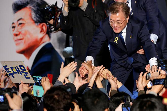 Moon Jae-in decisively won South Korea's presidential election on Tuesday, ending nearly a decade of conservative rule and bringing a more conciliatory approach toward Pyongyang. (Reuters) Moon Jae-in decisively won South Korea's presidential election on Tuesday, ending nearly a decade of conservative rule and bringing a more conciliatory approach toward Pyongyang. (Reuters)