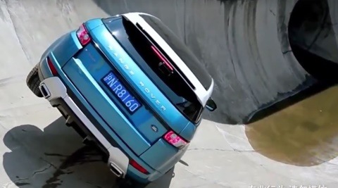 Watch this Range Rover break physics and the internet, all in a storm drain!