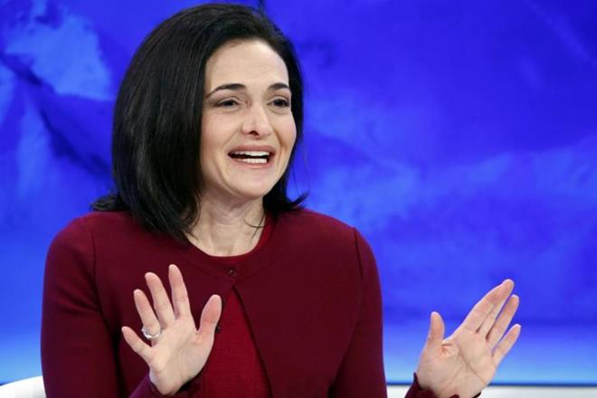 The Facebook Inc. chief operating officer said companies can't resolve social issues on their own and that the government needs to step in. (Reuters)