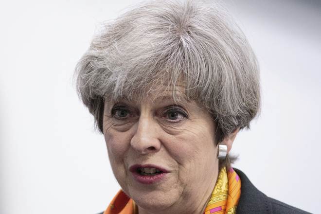 The cabinet minister hinted Theresa May’s Conservatives will rewrite their previous pledges on reducing migration when they publish their policy manifesto before the June 8 vote. (Associated Press)
