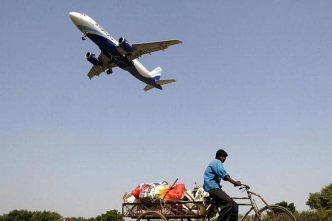 The average Indian is unlikely to be able to afford a Rs 2,500 flight -- 13.8 times the monthly spending on travel (Rs 180) in 2011-2012 -- under the governments new "Ude Desh Ka Aam Naagrik" (UDAN) programme. (Reuters) The average Indian is unlikely to be able to afford a Rs 2,500 flight -- 13.8 times the monthly spending on travel (Rs 180) in 2011-2012 -- under the governments new "Ude Desh Ka Aam Naagrik" (UDAN) programme. (Reuters)