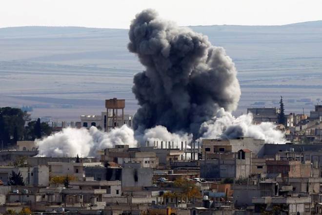 At least 12 people were killed and 30 others wounded on Friday by a fresh US-led airstrike on the northern Syrian province of Raqqa, state TV reported.(Representative photo: Reuters) At least 12 people were killed and 30 others wounded on Friday by a fresh US-led airstrike on the northern Syrian province of Raqqa, state TV reported.(Representative photo: Reuters)