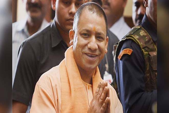 Yogi Adityanath wields broom, vows to make UP open defecation free by ...