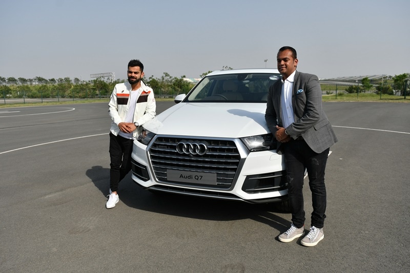 Audi Q7 45 TDI: Kohli's Q7 is in Carerra White. The current-generation Q7 is powered by a 3-litre TDI diesel engine that churns out a maximum of 245 bhp and develops a peak torque of 600 Nm from as low as 1500 rpm. It also gets a MMI infotainment system navigated via MMI Touch, the Audi sound system, music interface with two USB ports and a Bluetooth interface. It has also been given a 12.3-inch Audi Virtual Cockpit screen as well.
