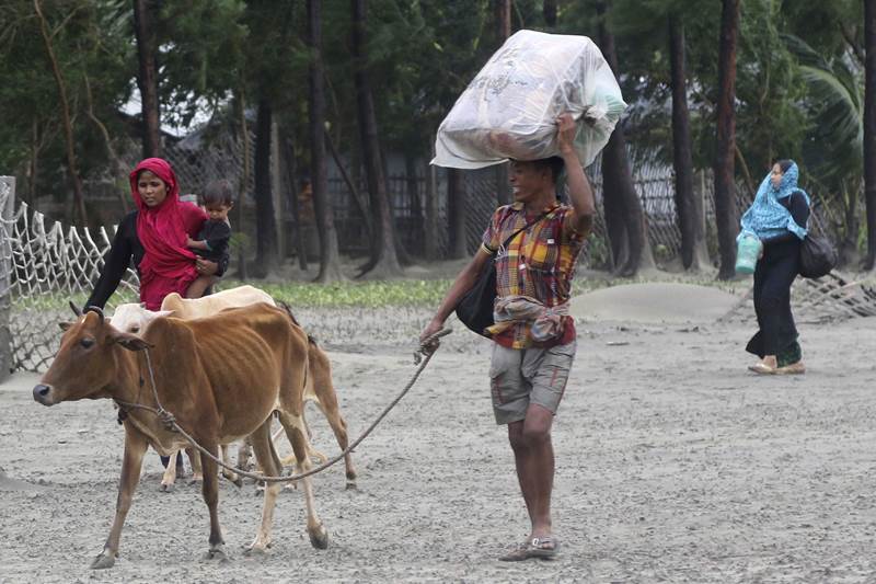 Cyclone Mora, viral images, cyclone mora viral images, mora, bangladesh, mora pictures, cyclone mora photos, cyclone mora bangladesh, bangladesh news, tropical storm bangladesh, bangladeshi evacuated, Chittagong, Cox's Bazar bangladesh, cyclone shelters bangladesh, Bay of Bengal, cyclone Bay of Bengal, Mass evacuation campaign launched, Mass evacuation bangladesh, maritime ports bangladesh, storm in bangladesh, cyclone in bangladesh, india braces for cyclone
