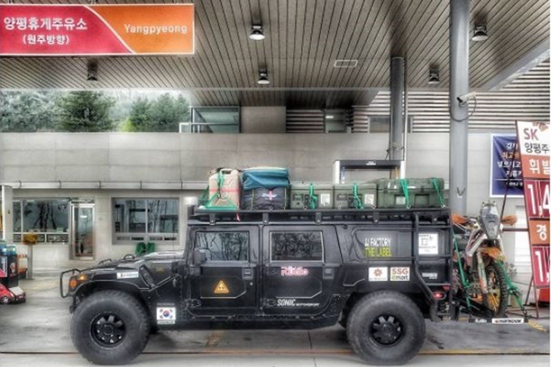 The two were recently married and in mid April they were all set to commence a journey of their lifetimes. Considering it was a Hummer, their final fuel stop before setting off must've taken a while, filling up jerry cans to take along.