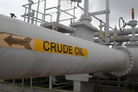 S&P lowered the Gulf state’s sovereign debt long-term rating to BB+, one level below investment grade, from BBB- and changed the outlook to negative, the New York-based firm said in a statement Friday. (Reuters)