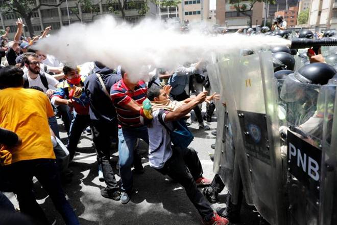 Venezuela, Riot police, military installation, tear gas, water cannon, protest, protesters Venezuela, Riot police, military installation, tear gas, water cannon, protest, protesters