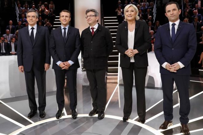 French voters are going to the polls Sunday to pick their new president, a stark choice between front-runner Emmanuel Macron and far-right Marine Le Pen. (Reuters)