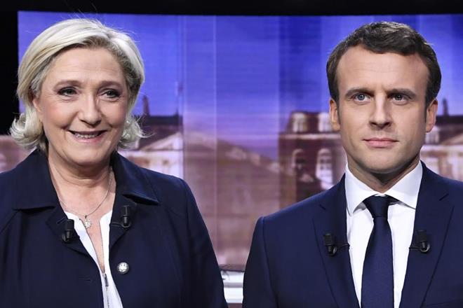 French voters will pick a new president today, choosing between young centrist Emmanuel Macron and far-right leader Marine Le Pen in a watershed election for the country and Europe. (Rueters) French voters will pick a new president today, choosing between young centrist Emmanuel Macron and far-right leader Marine Le Pen in a watershed election for the country and Europe. (Rueters)