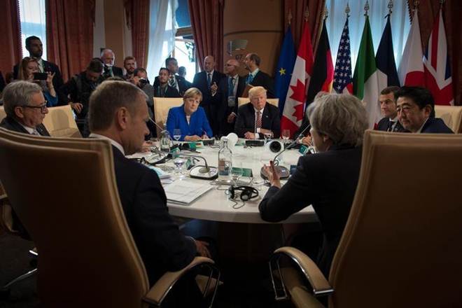 German Chancellor Angela Merkel, U.S. President Donald Trump and other leaders at the G7 summit in Taormina, Sicily, Italy, May 26, 2017. Guido Bergmann/Courtesy of Bundesregierung/Handout via REUTERS German Chancellor Angela Merkel, U.S. President Donald Trump and other leaders at the G7 summit in Taormina, Sicily, Italy, May 26, 2017. Guido Bergmann/Courtesy of Bundesregierung/Handout via REUTERS