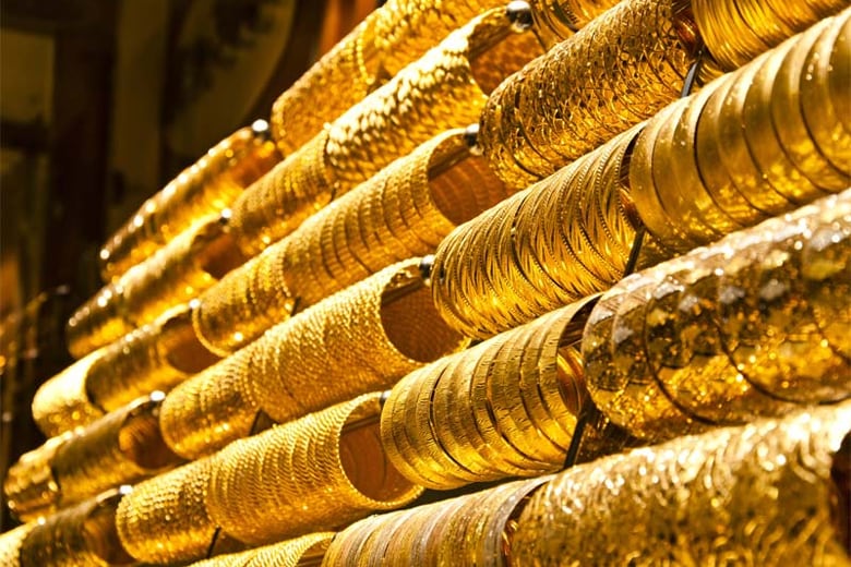 Gold , Gold prices,  US rate hike,  dollar value dips, selling gold price