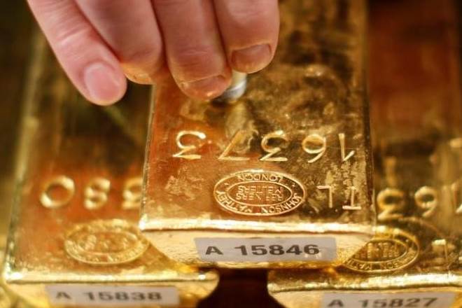 Spot gold was up 0.5 percent at $1,260.96 an ounce at 3:05 p.m. EDT (1905 GMT), while US gold futures settled 0.6 percent higher at $1,261.40. (Reuters) Spot gold was up 0.5 percent at $1,260.96 an ounce at 3:05 p.m. EDT (1905 GMT), while US gold futures settled 0.6 percent higher at $1,261.40. (Reuters)