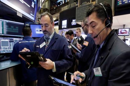 World stocks ease off record highs, Fed rate hopes boost dollar