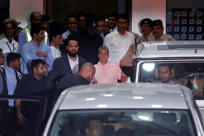 Canadian singer Justin Bieber leaves the airport terminal after arriving in Mumbai. (Reuters) Canadian singer Justin Bieber leaves the airport terminal after arriving in Mumbai. (Reuters)